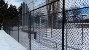 DC Fence Pros | Black Chain Link Fence vs Galvanized Chain Link Fence Black Chain Link Fence